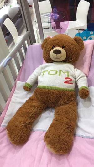 LINET at Africa Health - paediatric bed TOM2 with our little patient teddy bear