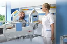 LINET Eleganza 5 nurse with patient Eleganza 5 on Africa Heatlh