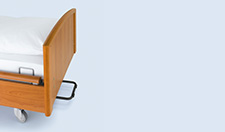 Head end wall spacer bracket